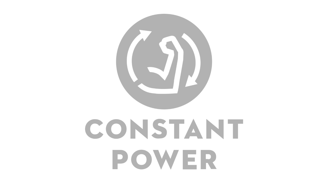Ikon egy hajlított felkarral és két nyíllal az óramutató járásával megegyező irányban, alatta „Constant Power”